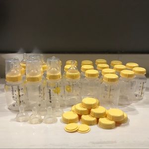 HUGE LOT Medela bottles, caps, nipples -slow flow